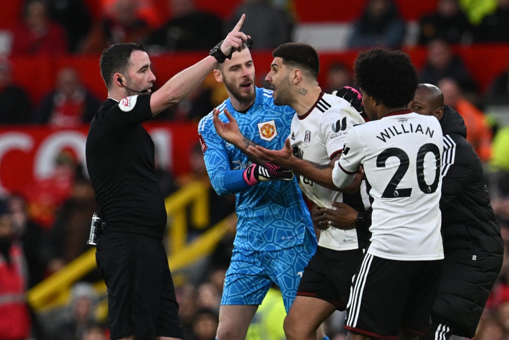 Chris Kavanagh sends off Fulham's Aleksandar Mitrovic against Man United.