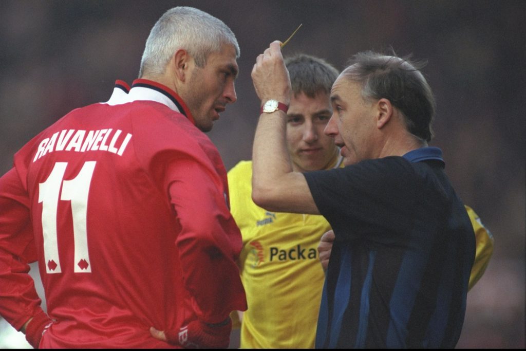 Fabrizio Ravanelli of Middlesbrough (left) is booked during a Premier League game against Leeds United