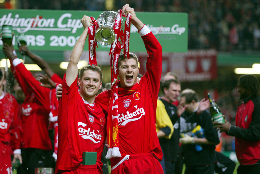 Michael Owen of Liverpool and Steven Gerrard of Liverpool celebrate with trophy after the Worthington Cup Final match between Liverpool and Manchester United