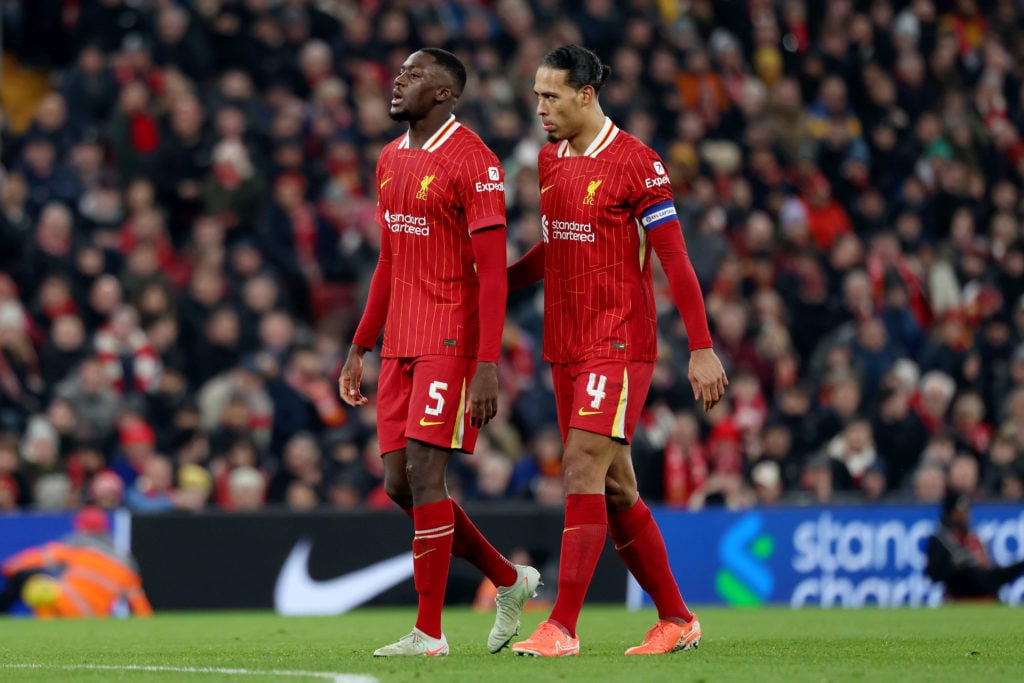 Ibrahima Konate and Virgil van Dijk of Liverpool interact during the Carabao Cup Semi Final Second Leg match between Liverpool and Tottenham Hotspur at Anfield on February 06, 2025