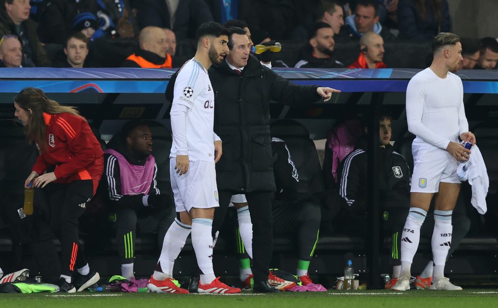 Unai Emery Manager of Aston Villa brings Marco Asensio of Aston Villa on as a substitute during the UEFA Champions League fixture vs Club Brugge