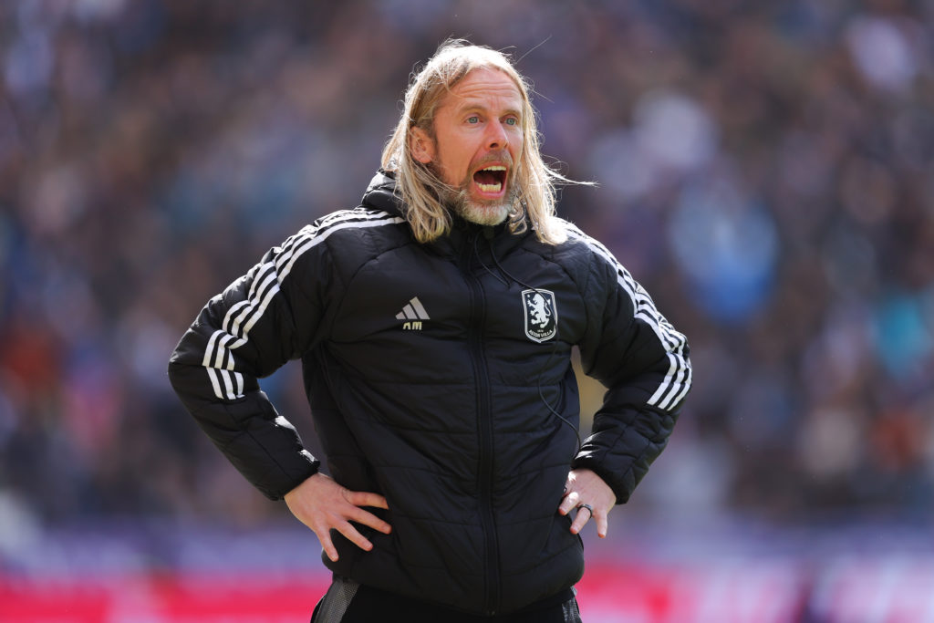 Set-piece coach Austin MacPhee screams instructions from the touchline during an Aston Villa game