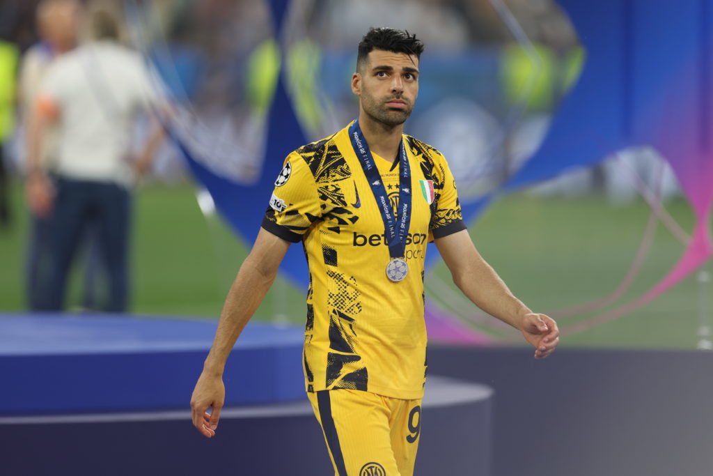 Mehdi Taremi collects his Champions League medal with Inter Milan.