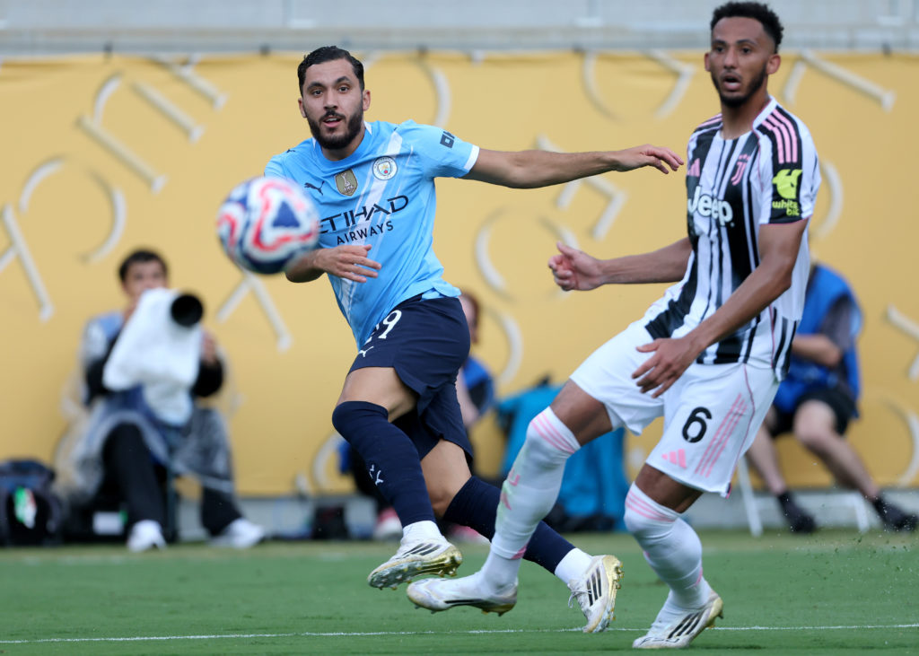 Ryan Cherki of Manchester City and Lloyd Kelly of Juventus FC in action during the FIFA Club World Cup 2025 group G match between Juventus FC and Manchester City FC at Camping World Stadium on June 26, 2025