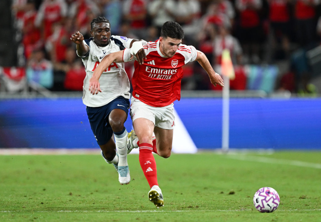 Tottenham's Mohammed Kudus duels with Arsenal's Declan Rice.