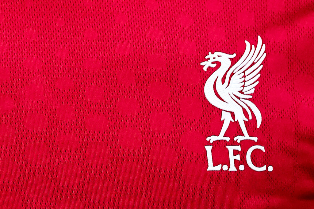 A closeup shot of the Liverpool badge on home kit