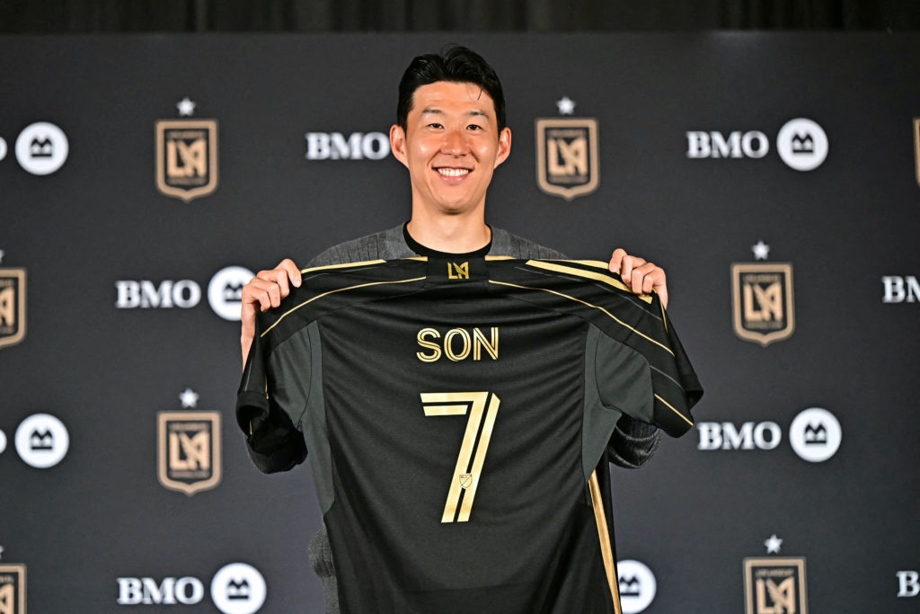 South Korean football player Son Heung-min holds his LAFC jersey during a press conference after joining the MLS side.