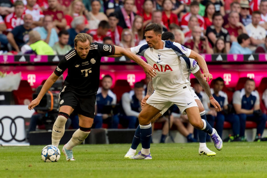 Harry Kane of Bayern Bayern Munich and Joao Palhinha of Tottenham Hotspur battle for the ball during the Pre-Season Friendly between the two sides.