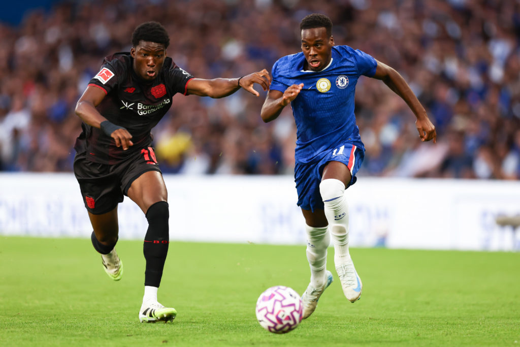Jamie Gittens of Chelsea and Axel Tape of Bayer Leverkusen during the pre-season friendly match between Chelsea and Bayer Leverkusen at Stamford Bridge on August 8, 2025