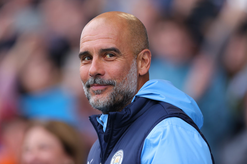 Josep 'Pep' Guardiola, head coach of Manchester City, issues instructions during a training session