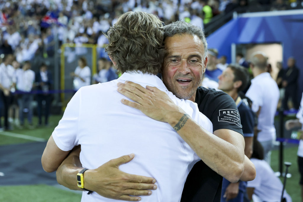 head coach Thomas Frank of Tottenham Hotspur and head coach Luis Enrique of Paris Saint-Germain