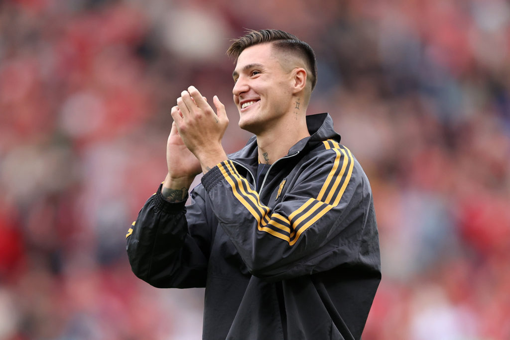 Benjamin Sesko applauds after signing for Manchester United