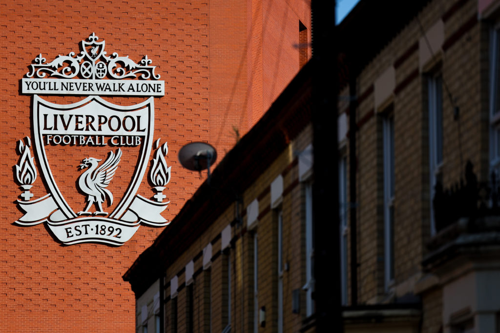 An external general view of the Liverpool badge on Anfield stadium