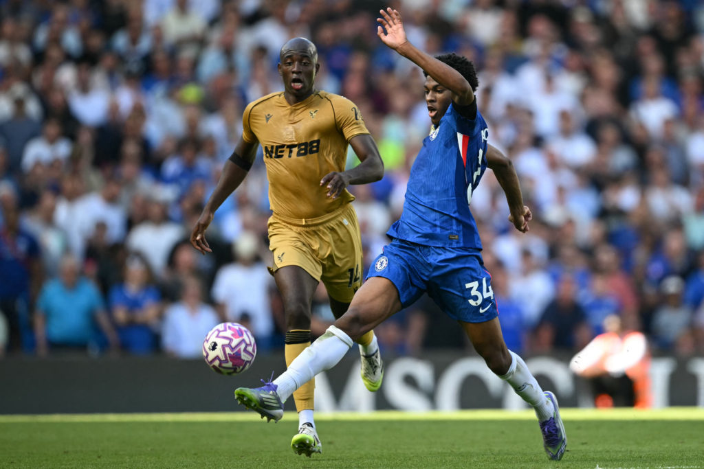 Chelsea defender Josh Acheampong in action against Crystal Palace striker Jean-Philippe Mateta