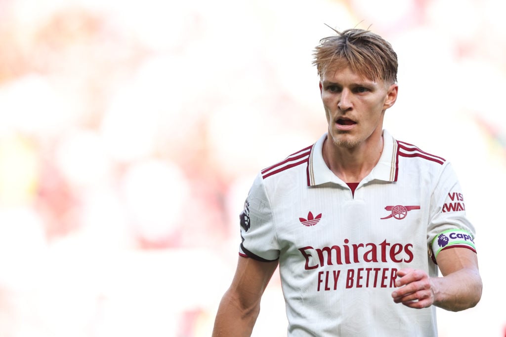 Martin Odegaard in action during a Premier League clash between Manchester United and Arsenal