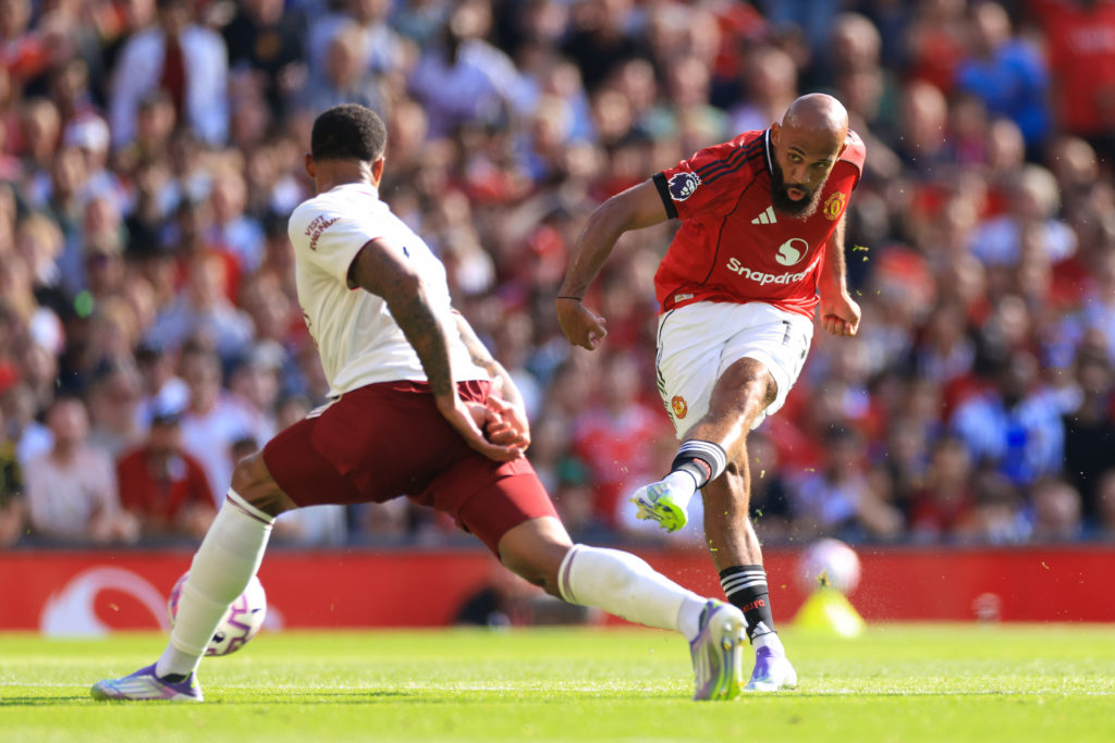 Bryan Mbeumo shoots against Arsenal for Manchester United.