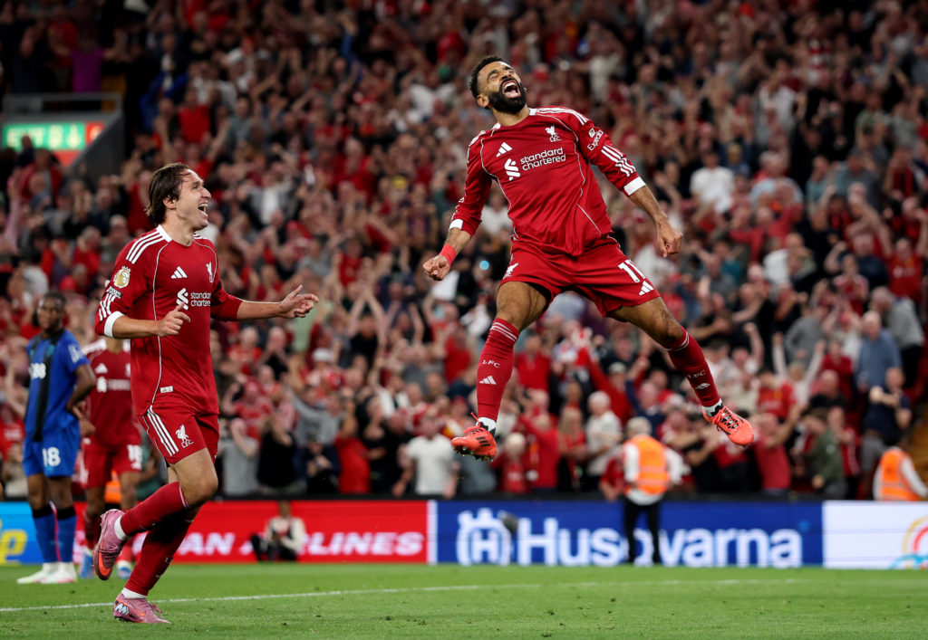 Mohamed Salah of Liverpool celebrates scoring his team's fourth goal during the Premier League match between Liverpool and Bournemouth at Anfield
