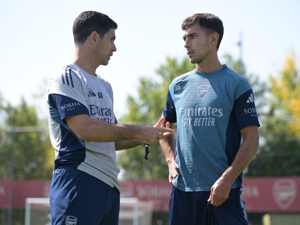 Mikel Arteta having a conversation with Martin Zubimendi during an Arsenal Training Session