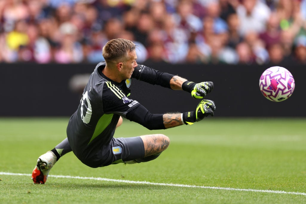 Marco Bizot makes a save during Aston Villa vs Newcastle United in the Premier League