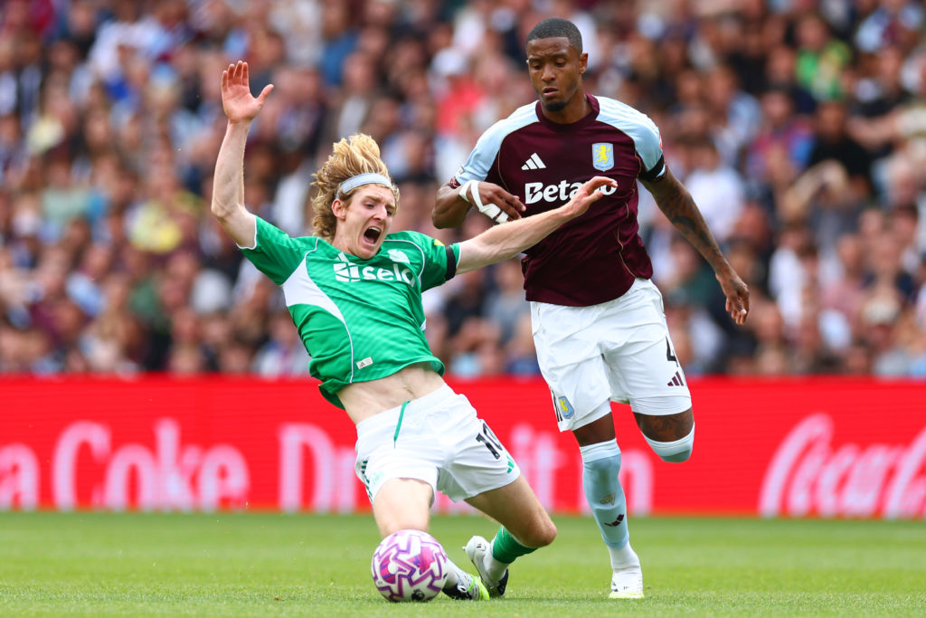Ezri Konsa fouls Anthony Gordon during a game between Aston Villa vs Newcastle United