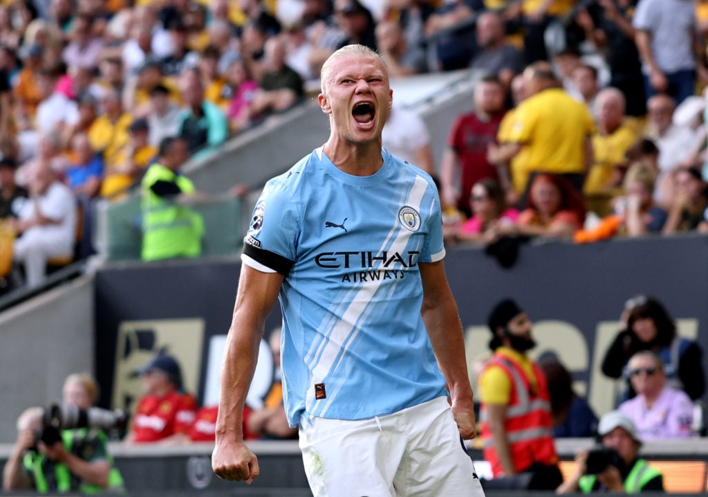 Erling Haaland of Manchester City celebrates scoring his team's third goal during the Premier League match between Wolverhampton Wanderers and Manchester City at Molineux