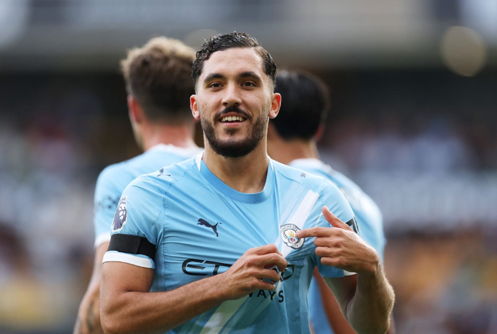Rayan Cherki of Manchester City celebrates scoring his team's fourth goal during the Premier League match between Wolverhampton Wanderers and Manchester City at Molineux