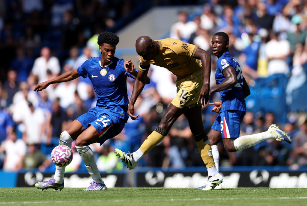 Jean-Philippe Mateta of Crystal Palace is challenged by Josh Acheampong of Chelsea during the Premier League match between Chelsea and Crystal Palace at Stamford Bridge.