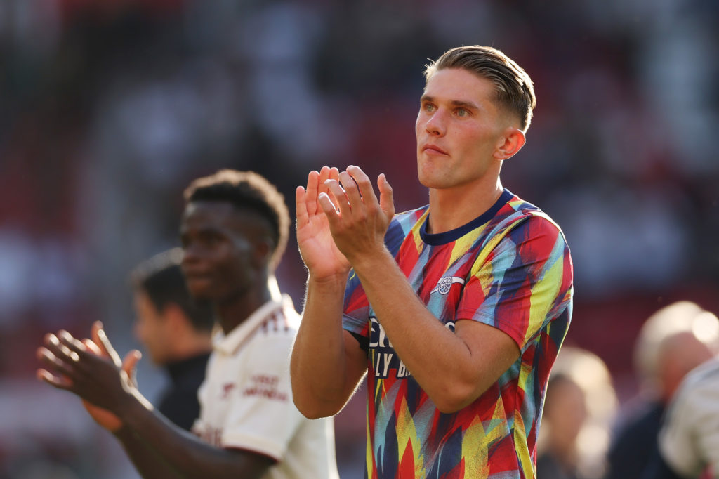 Arsenal striker Viktor Gyokeres applauds fans at Old Trafford