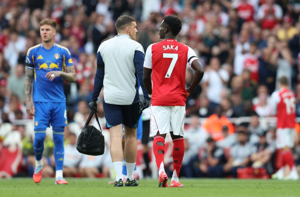 Bukayo Saka of Arsenal is substituted off injured after receiving medical treatment during the Premier League match between Arsenal and Leeds United at Emirates Stadium