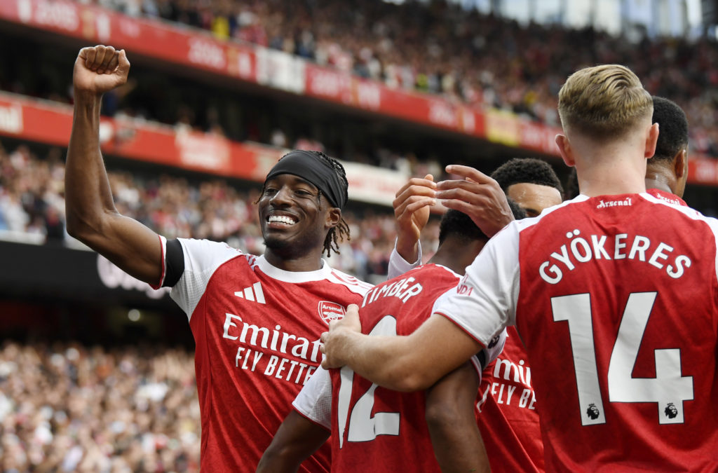 Arsenal players celebrate after scoring against Leeds United