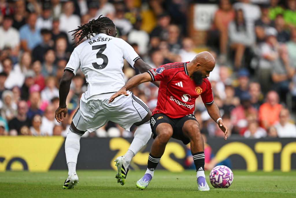 Calvin Bassey duels with Bryan Mbeumo during Fulham vs Manchester United in the Premier League.