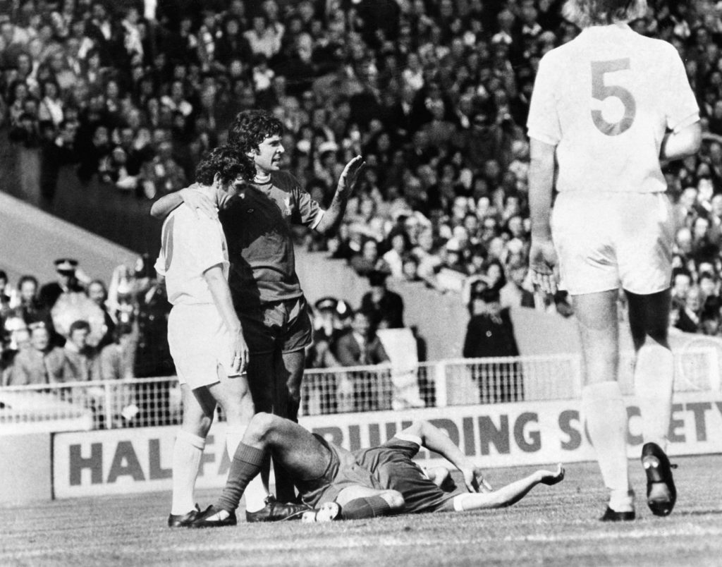 Johnny Giles stands over Kevin Keegan in the 1974 Community (then Charity) Shield final