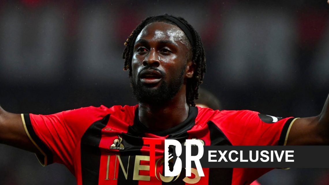 Image of Evann Guessand celebrating after scoring for OGC Nice, overlaid a TBR Exclusive banner