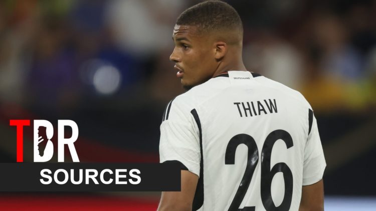 Image of Malick Thiaw in action for Germany against Colombia in a friendly, overlaid a TBR Exclusive banner