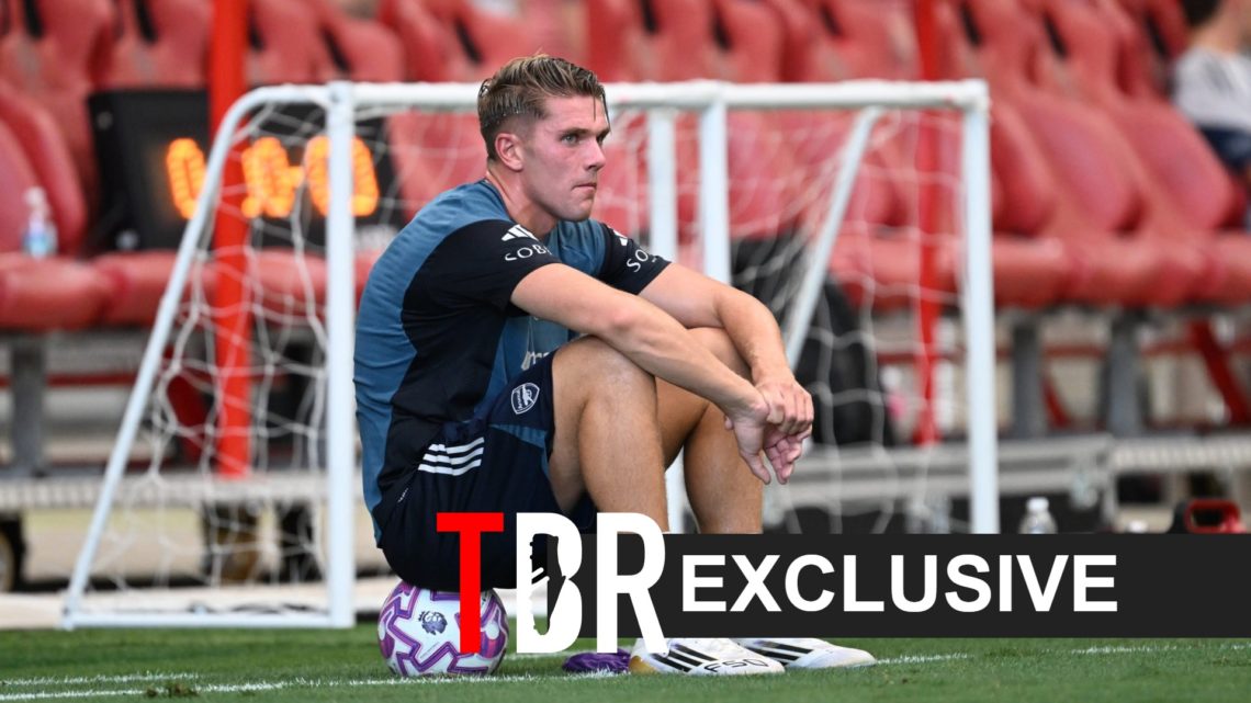 Image of Viktor Gyokeres sitting on a ball during an Arsenal training session, overlaid a TBR Exclusive banner