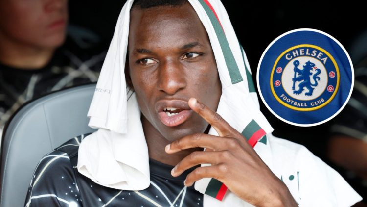 Nicolas Jackson looks on during the FIFA Club World Cup clash between Fluminense and Chelsea, Chelsea badge inset