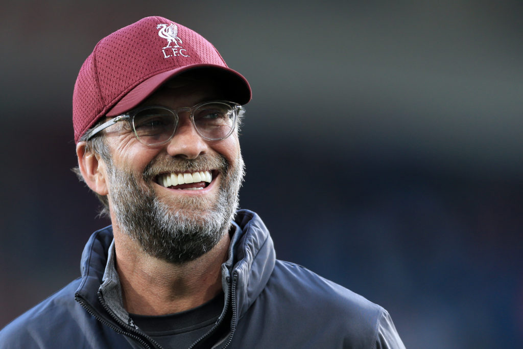 Jurgen Klopp laughs during Liverpool's clash with Huddersfield Town in the Premier League