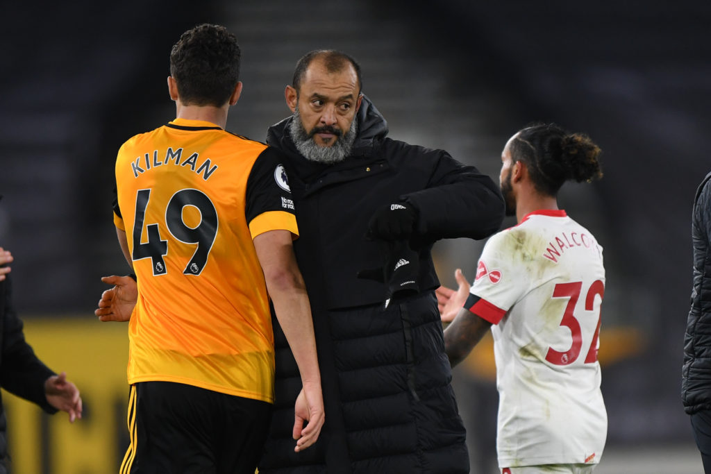 Nuno Espirito Santo congratulates Max Kilman during their time at Wolverhampton Wanderers