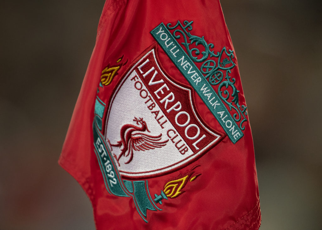 Closeup shot of the Liverpool badge on a corner flag at Anfield