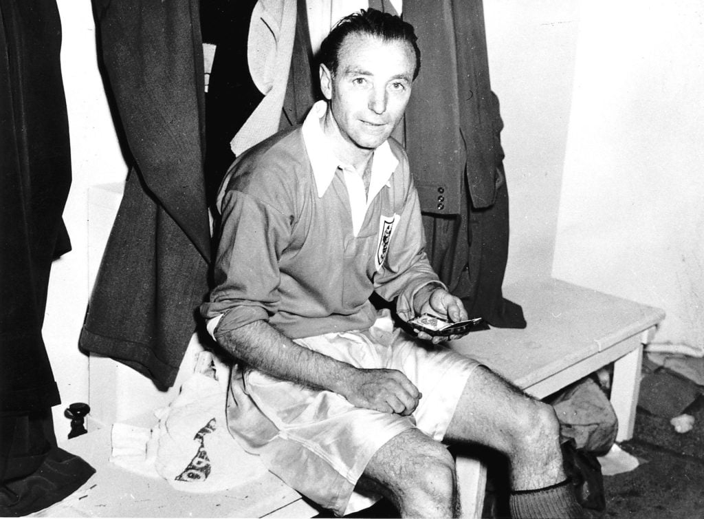 Blackpool footballer Stanley Matthews shows his winners medal after the victory over Bolton Wanderers in the FA Cup Final at Wembley 2nd May 1953