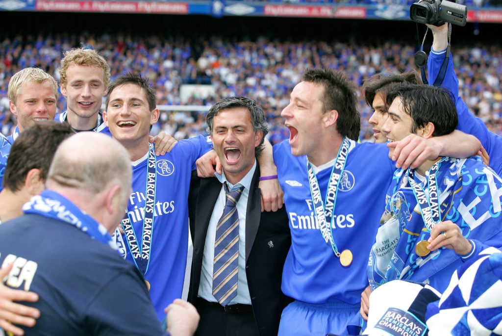 Jose Mourinho celebrates with Chelsea players in a clash with Charlton Athletic