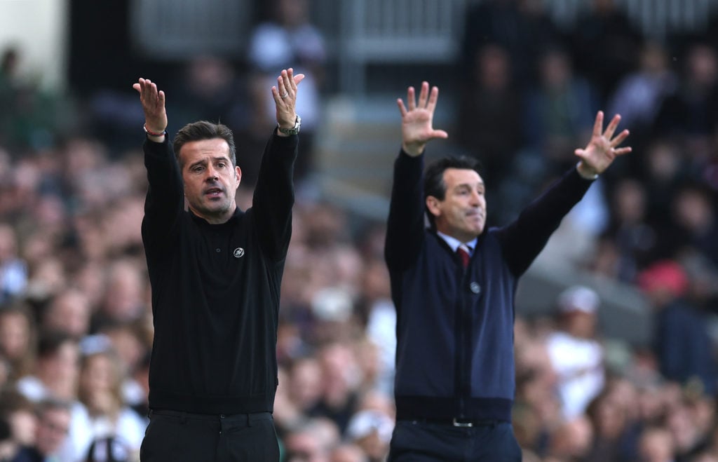 Marco Silva, Manager of Fulham, reacts alongside Unai Emery, Manager of Aston Villa