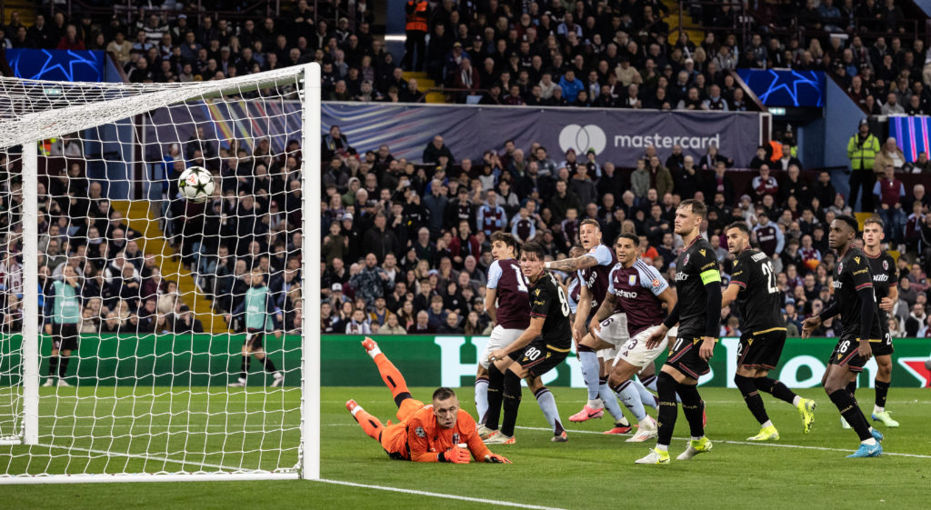 Bologna's goalkeeper Lukasz Skorupski is beaten from a free kick by Aston Villa's John McGinn for their first goal during the UEFA Champions League 2024/25 League Phase MD3 match between Aston Villa FC and Bologna FC 1909 at Villa Park on October 22, 2024
