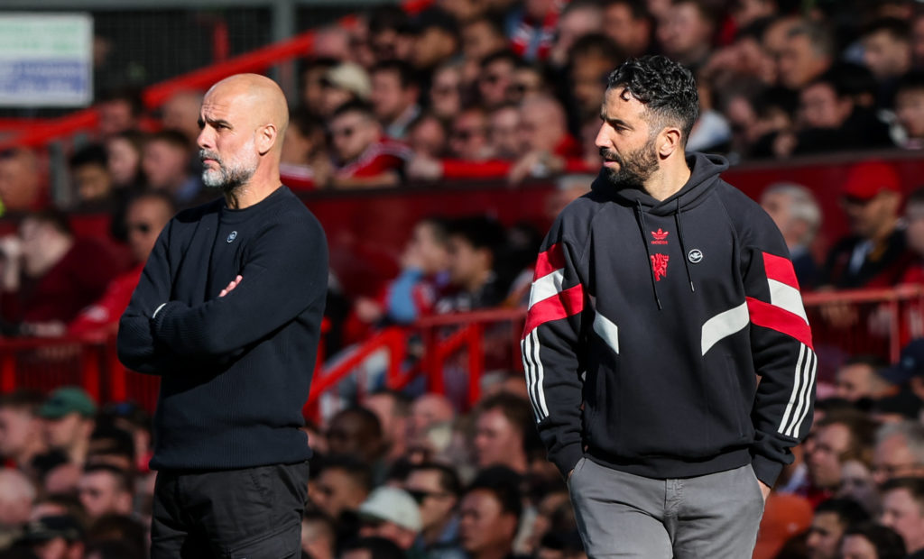 Manchester United manager Ruben Amorim and Manchester City manager Pep Guardiola look on during the Premier League match between Manchester United FC and Manchester City