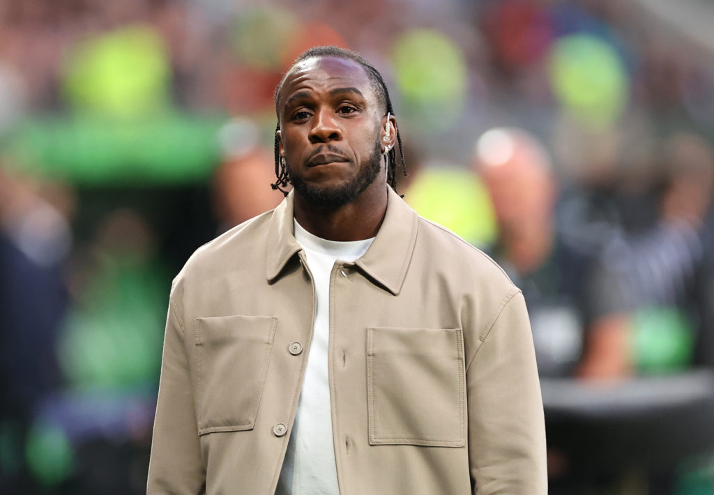 Michail Antonio is pictured on punditry duties for TNT Sport during the UEFA Conference League final