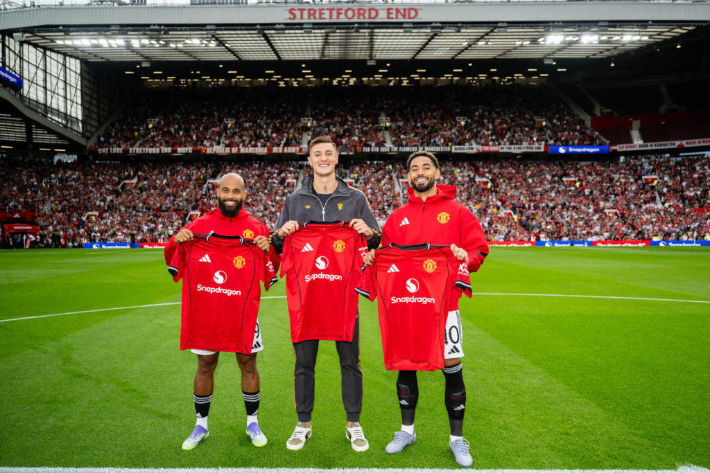 Manchester United new signings Bryan Mbeumo, Benjamin Sesko and Matheus Cunha pose with their shirts at Old Trafford