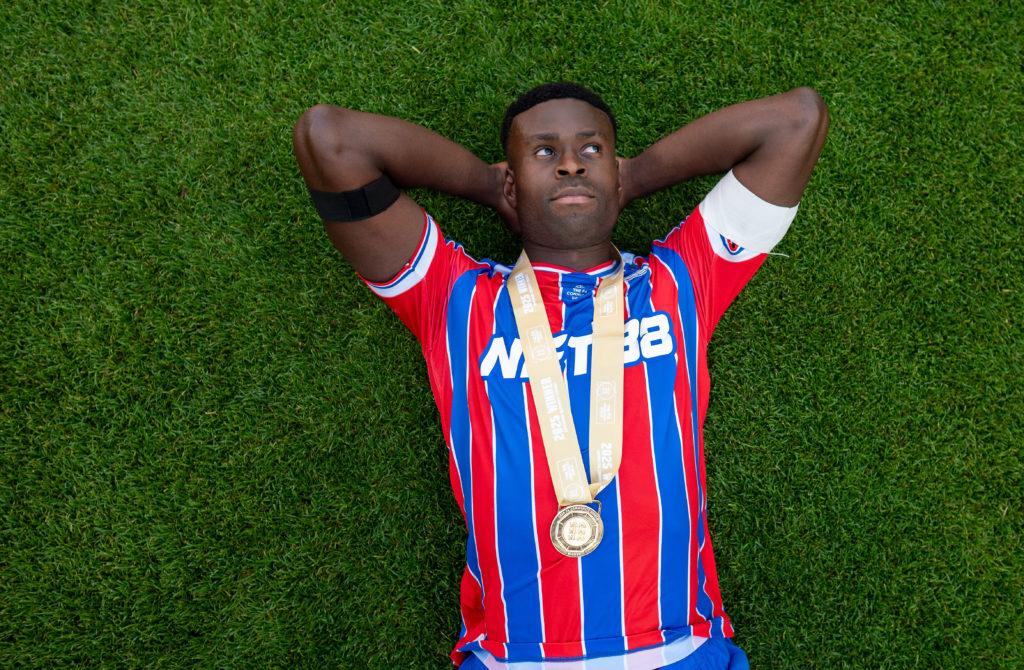 Marc Guehi celebrates after winning the 2025 Community Shield with Crystal Palace