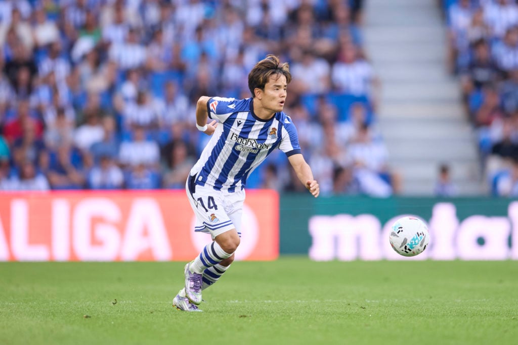 Takefusa Kubo dribbles with the ball during Real Sociedad vs Espanyol