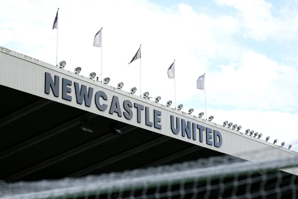 Signage displays the club name at Newcastle United's St James' Park