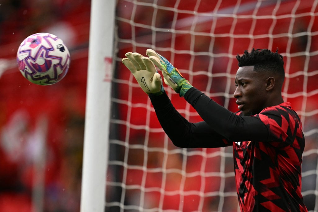 Andre Onana warms up before Manchester United v Burnley